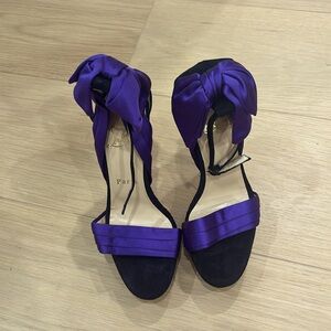 Christian Louboutin Satin Bow purple heels.